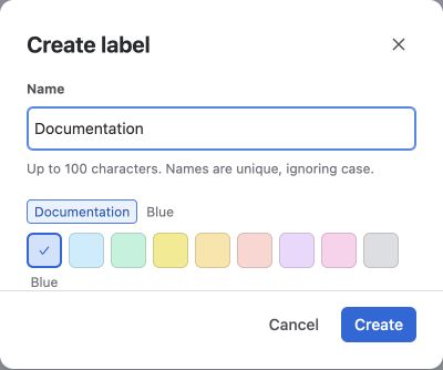 The Create label dialog with a Name field, a preview of the label and a row of colour swatches.